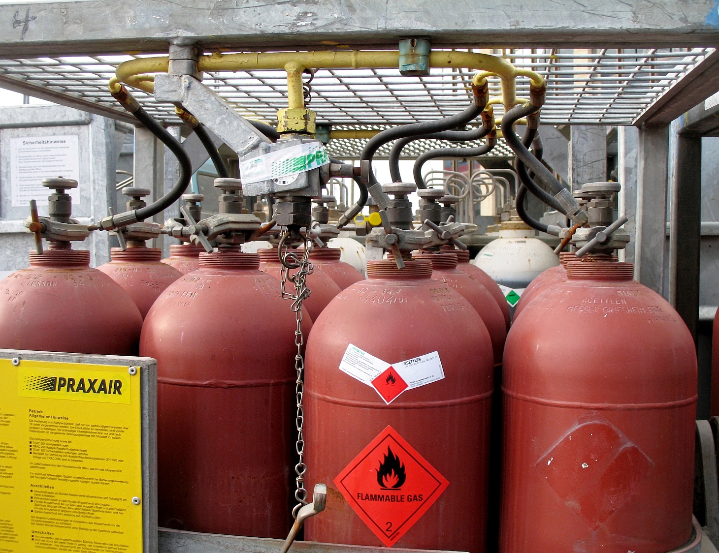Welding gas cylinders staged on a construction site